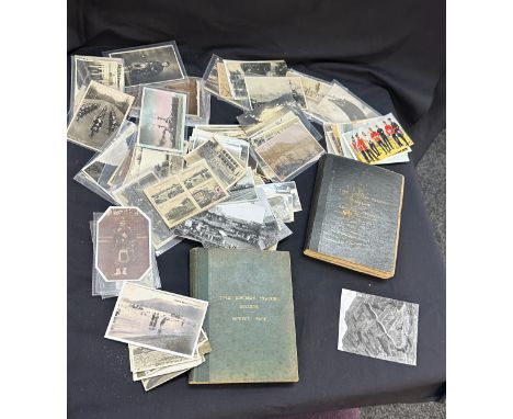 Selection of vintage postcards and vintage college education books 