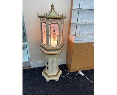 Oriental light up pagoda box on base, overall height 53 inches 