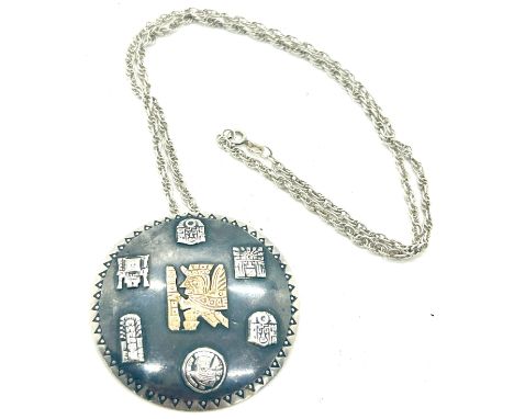 Silver Inca design medallion pendant with a 18k gold Inca insert symbol on a silver chain, diameter of medallion 5.5cm 