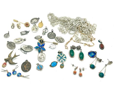 Selection of vintage ladies earrings, religious pendants, amber silver pendant, costume jewellery etc 