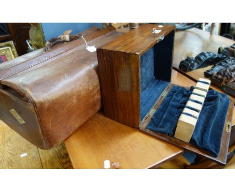A VINTAGE LEATHER GLADSTONE BAG and a 19th century walnut box