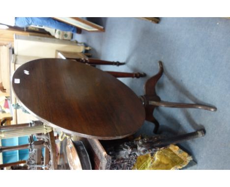 A GEORGE III OAK TRIPOD TILT TOP TABLE, 76cm dia.