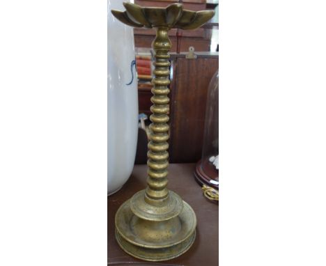 JUDAICA: A circular brass column Menorah lamp with inscription, 44cm high