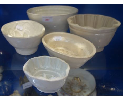 A COLLECTION OF VICTORIAN CERAMIC JELLY MOULDS (5)