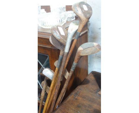 A COLLECTION OF VINTAGE HICKORY SHAFTED GOLF CLUBS