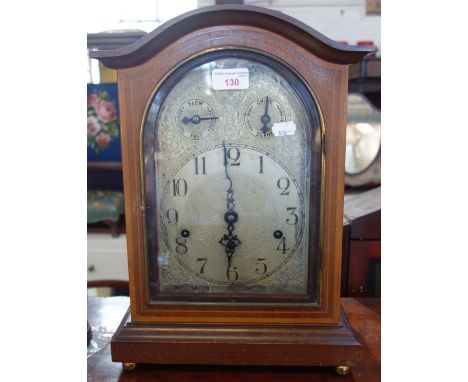 AN EDWARDIAN MAHOGANY CASED BRACKET CLOCK with silvered dial, 40.5cm high