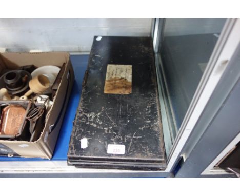 A VINTAGE BLACK TIN DEED BOX