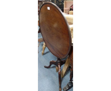 A GEORGE III MAHOGANY TIP TOP TRIPOD TABLE, 61cm dia.