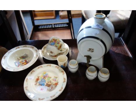 A CONTINENTAL CERAMIC SPIRIT BARREL and three cups and a collection of Bunnykins nursery china