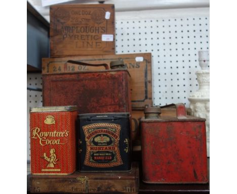 A COLLECTION OF VINTAGE PETROL CANS, wooden crates and tins