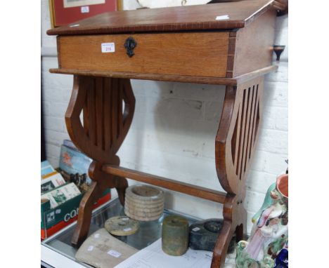 A VINTAGE ARTS &amp; CRAFTS OAK CHILD'S DESK, 50cm wide