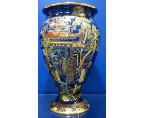 A BLUE GROUND CARLTONWARE VASE decorated with Oriental scenes, 20cm high