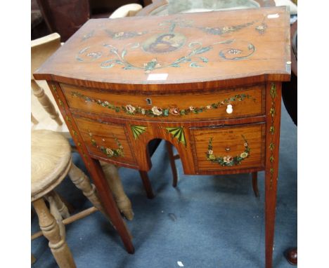 AN EDWARDIAN SATINWOOD BOWFRONTED SIDE CABINET painted with a portrait of a woman, floral swags and flowers, 77cm high x 54,5