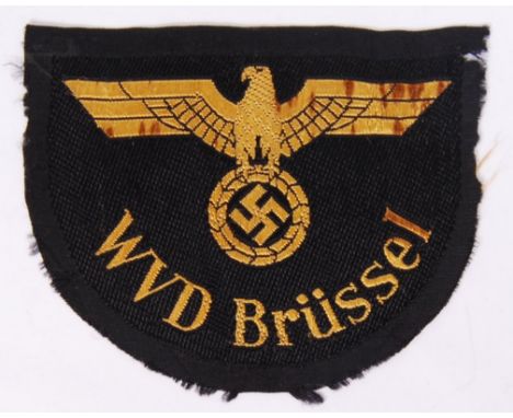 An original WWII Second World War Nazi German Third Reich railway WVD Brüssel cloth uniform patch, with eagle swastika emblem