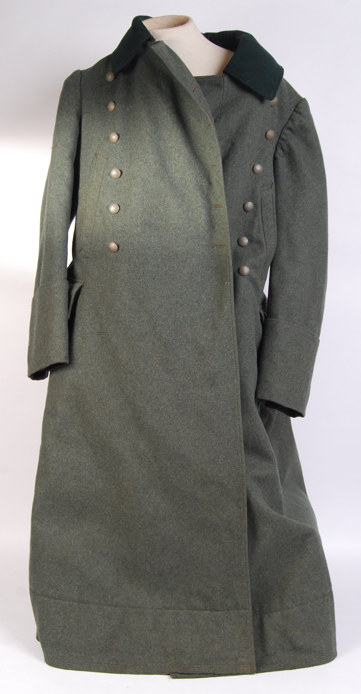 A vintage WWII Second World War German military heavy wool green trench