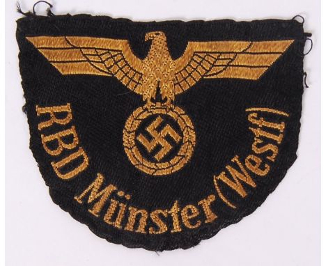 An original WWII Second World War Nazi German Third Reich railway RBD Munster ( Westf ) cloth patch, with eagle swastika embl