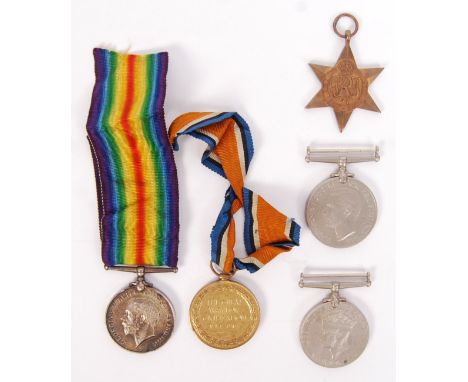 A WWI &amp; WWII Father &amp; Son medal group. Comprising of a First World War pair awarded to a 25447 Pte C Arberry of the D