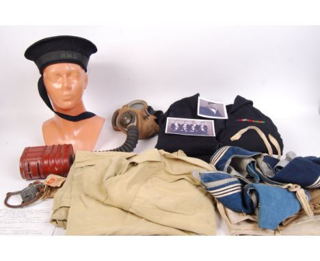 A collection of WWII Second World War Royal Naval personal effects belonging to Eric Saxton Lyne , who served in the Royal Na