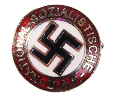 A 20th century reproduction Nazi German ' National Sozialistische D.A.P. ' enamel party pin badge with RZM mark to reverse.&n