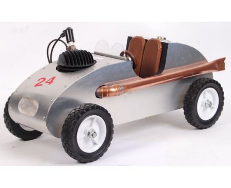 An unusual large American style shelf art / shop display scratch built model motor car. Made from sheet metal, with copper de
