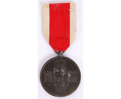 An original WWII Second World War German Third Reich / Nazi ' Social Welfare ' medal. Complete with the original ribbon. Depi