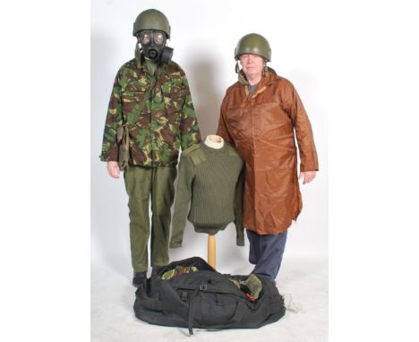 An incredible Iraqi War Sniper's kit bag, with contents. Comprising of the complete uniform kit - to include; Two&nbsp;combat