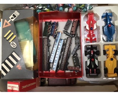 Model Railway: A collection of assorted OO gauge railway comprising two 0-6-0 Locomotives, four coaches, six wagons, along wi