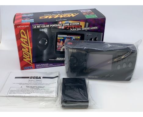 Sega Genesis Nomad Console, 16 Bit Color Portable Game System, boxed, original packaging, complete with instructions. UNUSED.