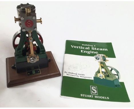 Stuart Turner: A vertical steam engine, Stuart Turner, 10V, on wooden plinth with brass plaque, 6” high, 3” flywheel, 3/4 “ b
