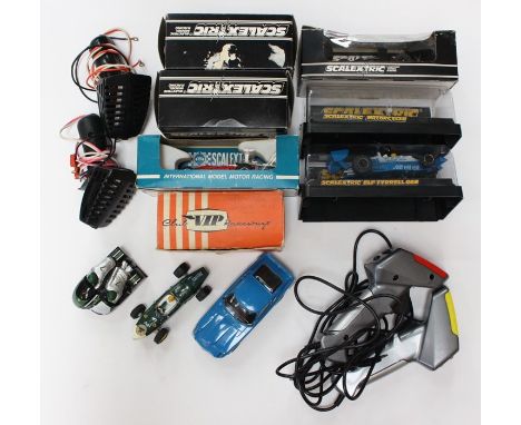 Scalextric: A collection of assorted Scalextric items to include: two boxed and two unboxed hand throttles, a boxed Shadow F1