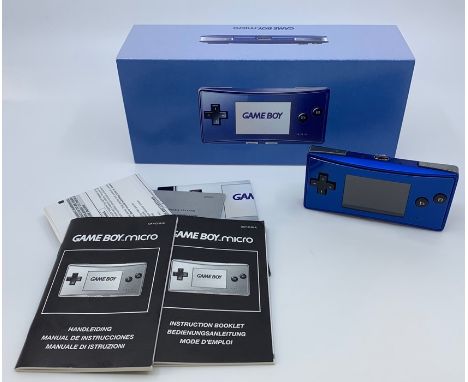 Gameboy Micro Game Console, blue, 2005, original box, complete with instructions and charger, very good condition, as new.