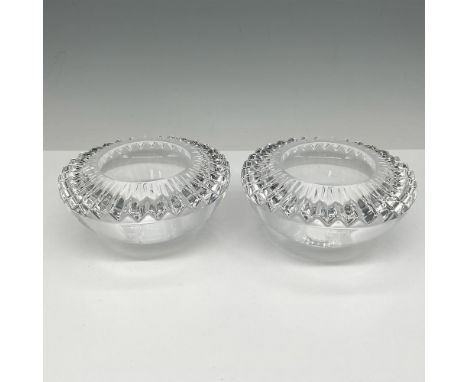 Round clear crystal base rimmed with pleat cut crystal. Orrefors mark. 6719483. This item has its original box: 5"L x 5"W x 2