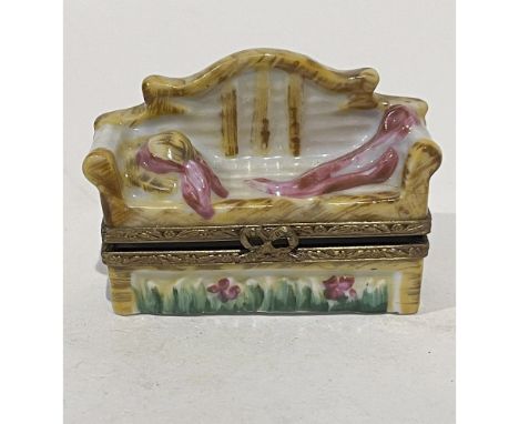 Limited Edition hand painted garden bench mini box. A garden hat and matching scarf lay atop the bench with flowers and green