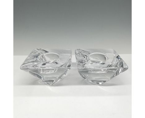 Distinctive twisted crystal design with clear center for tealight. Orrefors mark. This item has its original box: 4"L x 4"W x