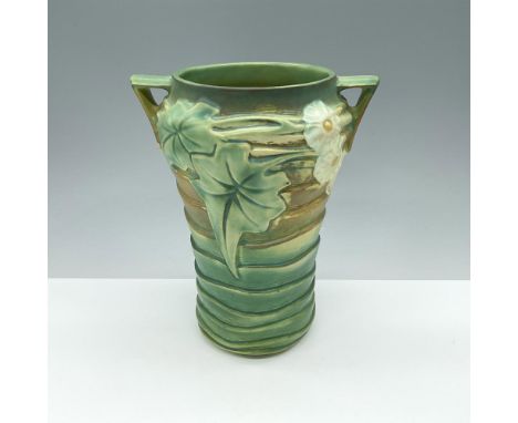 Green, brown, and white raised step vase featuring raised luffa blossom relief design. Blue marks to base. Roseville sticker 