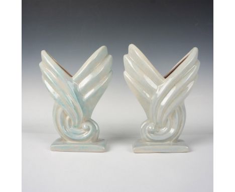 2 pottery table vases. Depicted in a pale blue, almost light gray, and pink glaze. Gonder USA 510 carved marking on the under