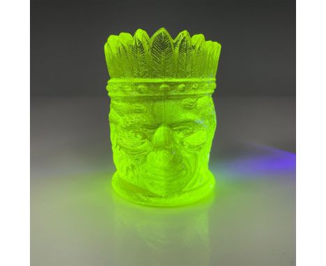 Depiction of an American Indian head in yellow uranium glass. Fluoresces under black light. Issued: 20th centuryDimensions: 2