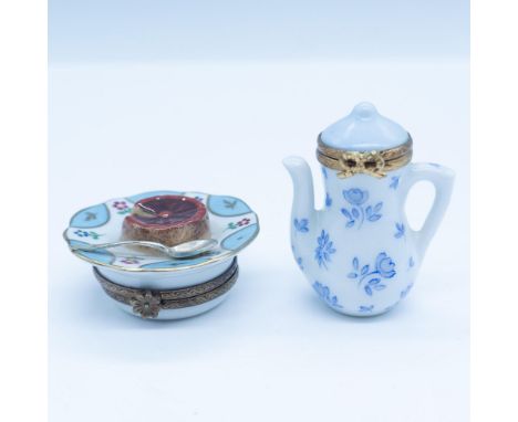 This duo includes: A light blue flower decorated tea pot, part of a limited edition, this is number 3 of 25; Alongside an ado