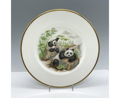 An adorable depiction of two Pandas on fine English bone china with gold band around rim. This item has its original box whic