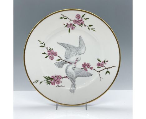 A beautiful pair of doves perched in pink blossoms on fine Bone China with gold band around rim. This item has its original b
