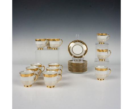 White fine china decorated in 22kt gold trims, the edge features an acid-etching clover pattern over the gold band. Set inclu