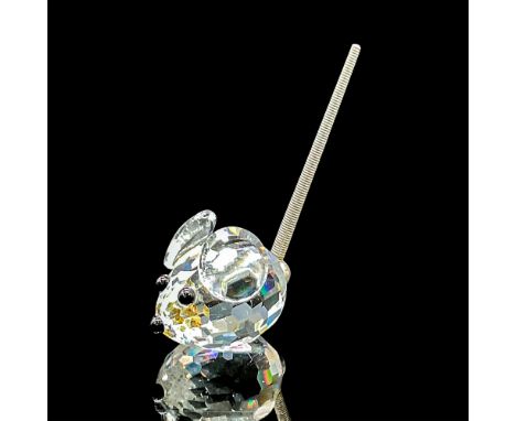 Clear faceted crystal tiny figure of a mouse with a metal spring tail. Swarovski mark. Item number 7655NR23. Part of the In A