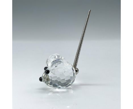 This mouse, a clear crystal figure with black crystal eyes and nose, complemented by a metal spring coil tail, was also an or