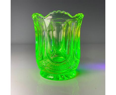 Tulip Vase-shaped toothpick holder in yellow uranium glass with paneled sides. Fluoresces under black light. Issued: 20th cen