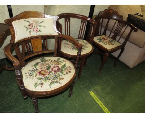 THREE EDWARDIAN MAHOGANY INLAID SIDE ARMCHAIRS WITH FLORAL TAPESTRY SEATS.