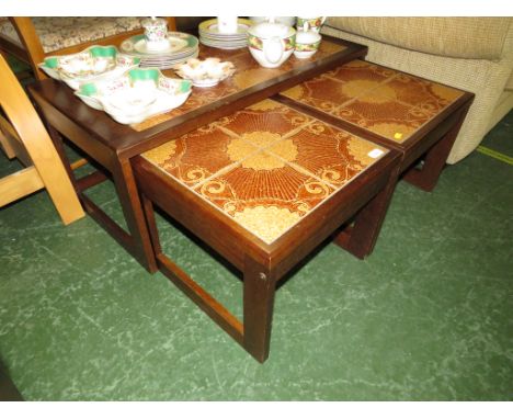 WOOD VENEER TILE TOP COFFEE TABLE AND TWO NEST TABLES.