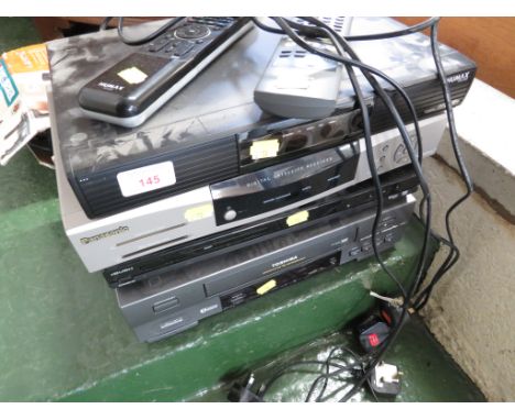 TOSHIBA VHS PLAYER WITH REMOTE, BUSH DVD PLAYER , PANASONIC RECEIVER AND A HUMAX FREEVIEW RECORDER WITH REMOTE.