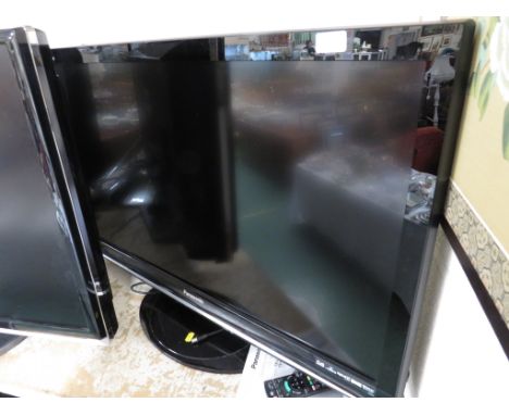 PANASONIC VIERA 37 INCH TELEVISION WITH REMOTE AND MANUAL.
