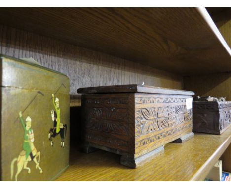 TWO CARVED WOODEN CIGARETTE BOXES, TOGETHER WITH PLAYING CARDS BOX.