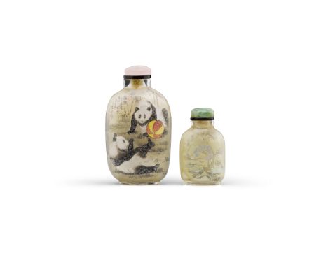 Two inside-painted glass snuff bottles'Panda' bottle: Wang Xiqian, 1982The first painted to the interior with two playful pan